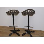 Pair of cast iron tractor seat stools { 78cm H X 40cm Sq }.