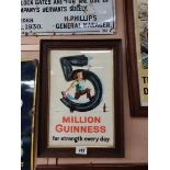 Guinness Five Million framed advertising print. {51 cm H x 26 cm W}.
