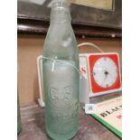 19th C. glass Codd bottle -The Phoenix Co Dublin { 22 cm H x 6 cm Dia}.