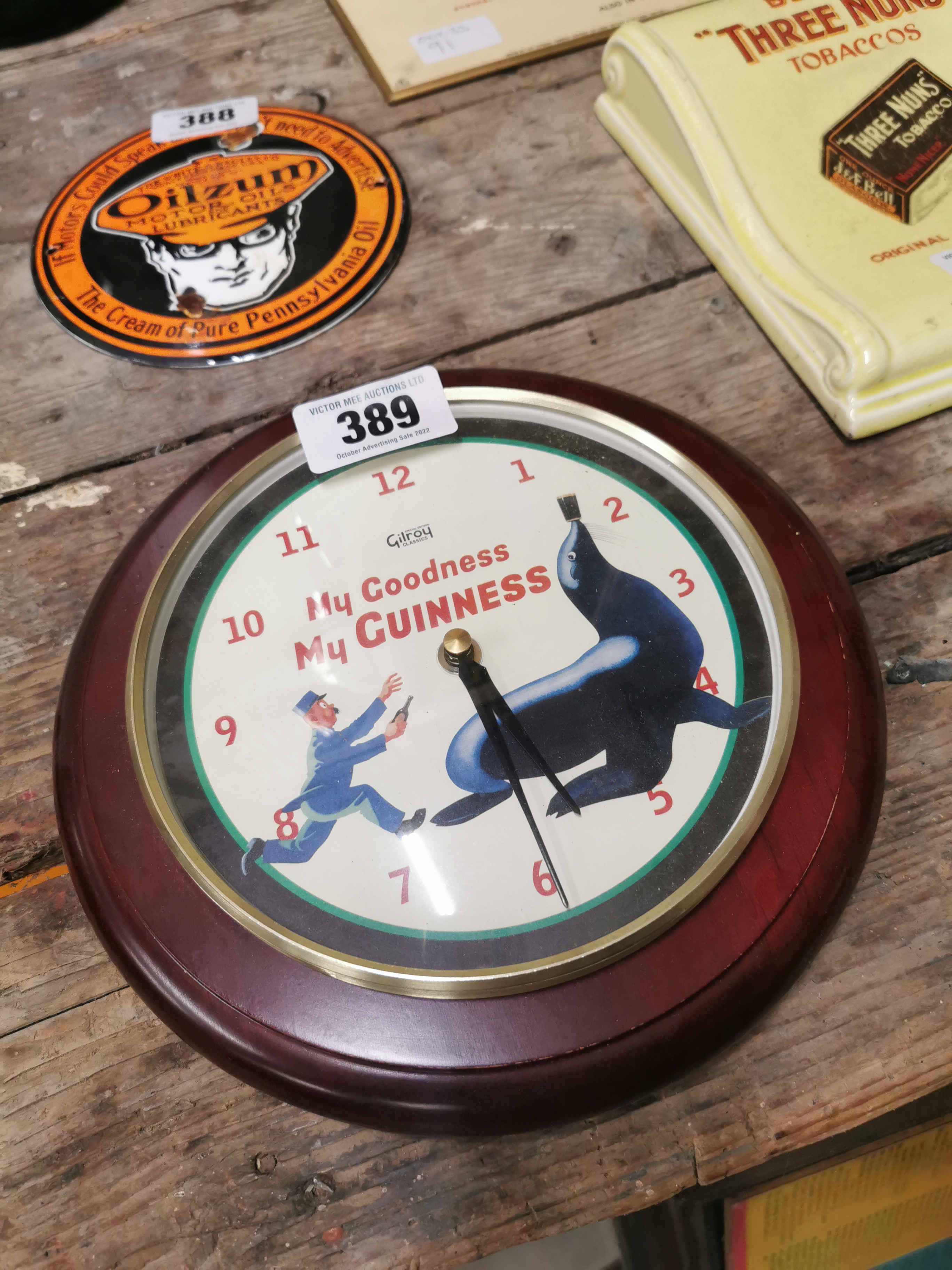 MY GOODNESS MY GUINNESS Seal advertising clock. {23 cm Dia}