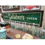 Rare Deluxe Gallaher's Green reverse painted glass advertising sign {31 cm H x 129 cm W}.