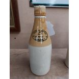 John Keill Wine Merchant Limerick stoneware Ginger beer bottle. { 20 cm H x 7 cm Dia}