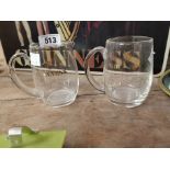 Two Guinness glass tankards 1985 (Cork 800}. {18 cm H}.