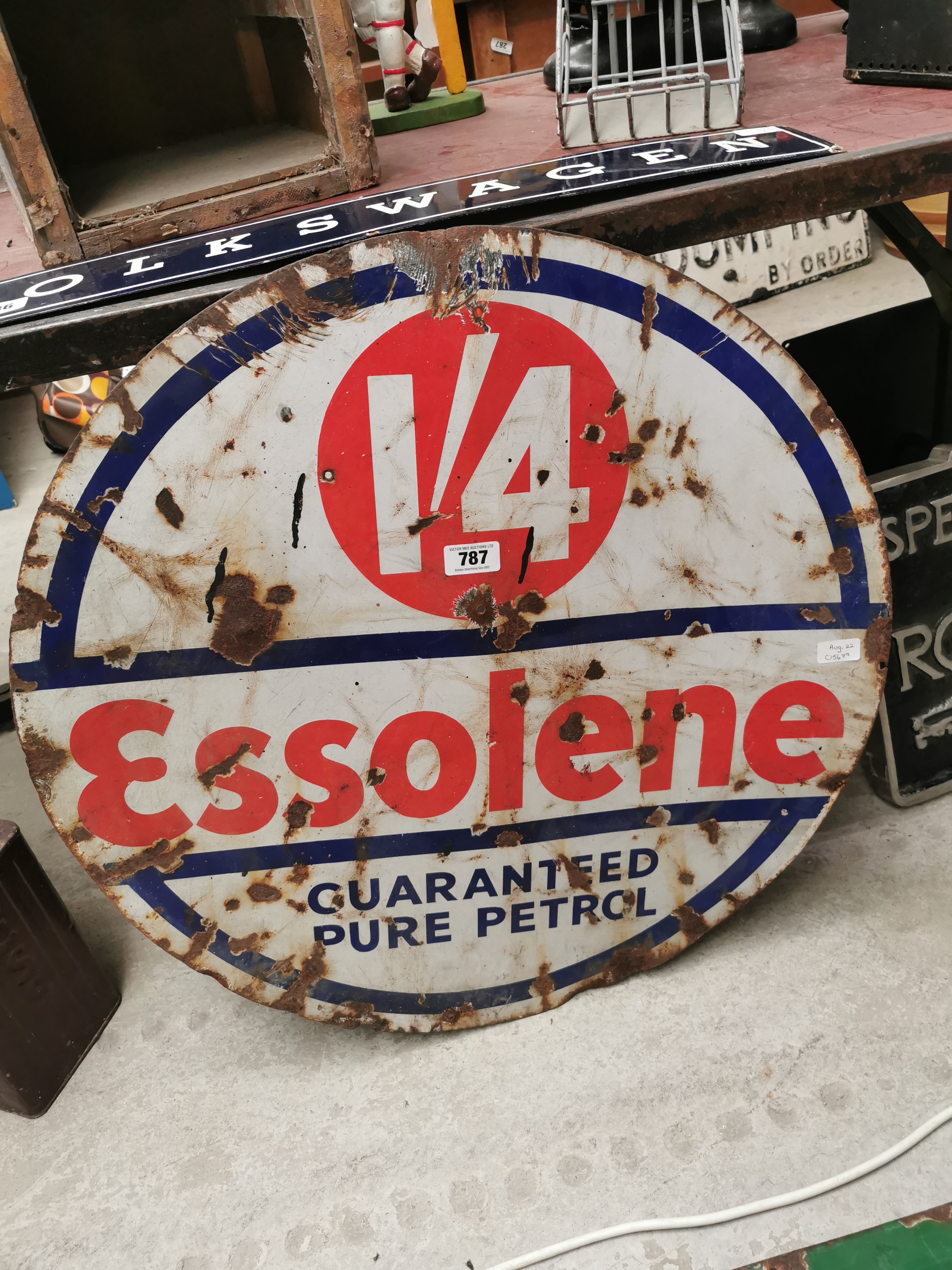 Essolene Guaranteed Pure Petrol enamel advertising sign. { 76 cm Dia}.