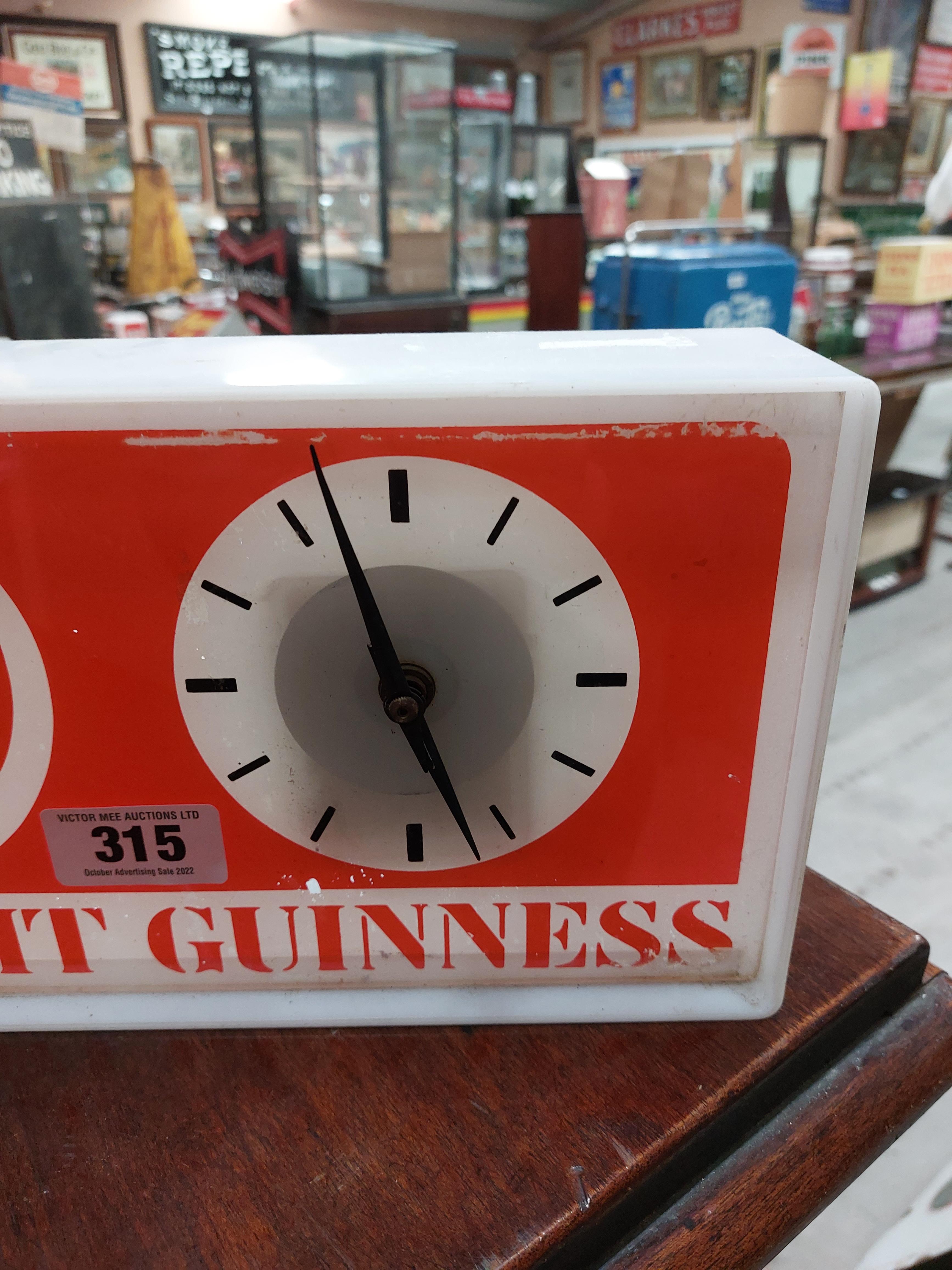 Perspex Draught Guinness light up advertising clock { 18 cm H x 36 cm W x 7 cm D}. - Image 3 of 3