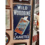 Original Wild Woodbine Cigarettes enamel advertising sign. { 90 cm H x 45 cm W}.