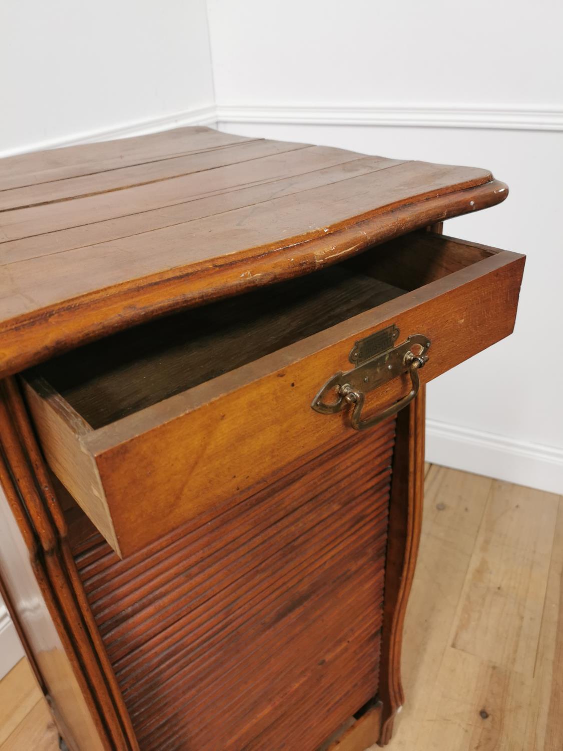 Early 20th. C. oak tambour cabinet with single short drawers above the tambour door enclosing - Image 4 of 5