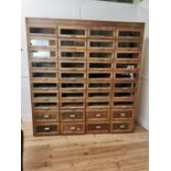 1950's Oak haberdashery cabinet with forty short drawers {190cm H x 180cm W x 52cm D}