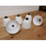 Set of six 1940's opaline glass hanging shades with origianl brass brackets { 23cm H X 22cm Dia }.