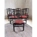 Set of six Edwardian mahogany dining chairs with inset leather seats raised on square legs in the