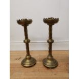 Pair of brass candle sticks { 46cm H X 14cm Dia }.
