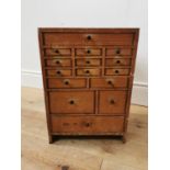 Early 20th. C. pine watch maker's drawers, the long drawer over nine short drawers, four short