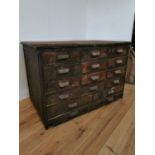 Early 20th C oak bank of fifteen drawers. {100 cm H x 150 cm W x 89 cm D}.
