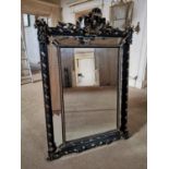 Good quality 19th. C. ebonised and gilt wall mirror the centre bevelled plate flanked by four narrow