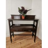 Art Nouveau mahogany server the gallery back over a open shelf with two frieze drawers raised on