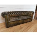 Early 20th C hand dyed leather deep buttoned three seater Chesterfield sofa. {73 cm H c 203 cm W x