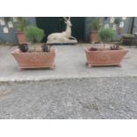 Pair of good quality moulded terracotta rectangular planters with basket weave decoration mounted on