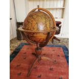 Globe on stand in the form of a drinks' cabient { 120cm H X 80cm Dia }.