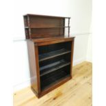 Good quality Regency rosewood floor bookcase with brass inlay, the gallery back with two shelves