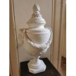Grand tour plaster lidded urn decorated with acanthus leave garlands and masks, the lid with