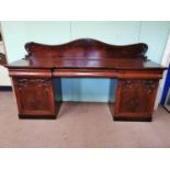 19th. C. mahogany pedestal sideboard the shaped back above a long centre drawer flanked by two