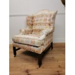 Mahogany and Kilim upholstered wing back arm chair raised on square legs {107 cm H x 75 cm W x 85 cm