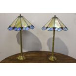 Pair of brass table lamps with stain glass shades in the Tiffany style { 70cm H X 73cm Dia }.