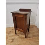 Edwardian mahogany bedside locker the gallery back above a single paneled door raised on tapered