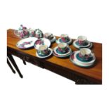 Twenty two piece hand painted ceramic tea set, S. Fawsitt