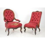 Pair of 19th. C. deep buttoned upholstered carved mahogany ladies and gents armchairs raised on