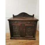 19th. C. ornately carved oak side cabinet the gallery back above a long drawer and two panelled