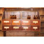 Chemist's mahogany bank of eight drawers { 64cm H X 117cm W X 40cm D }.