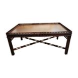 Edwardian mahogany coffee table with pierced gallery back raised on sqaure legs, in the