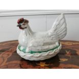 Early 20th. C. ceramic hen on nest { 17cm H X 23cm W X 16cm D }.