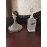 Cut glass whiskey decanter and cut glass brandy decanter { 28cm H & 26cm H }.