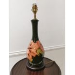 Moorcroft green Hibicus pattern pottery table lamp mounted on wooden base . { 39cm H X 13cm Dia }.