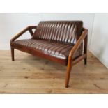 Mahogany two seater sofa in the Aviator style { 75cm H X 130cm W X 80cm D }.