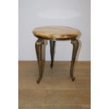 Brass coffee table with circular onyx top. { 46cm H X 40cm Dia }.