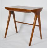 Cherry wood writing with single drawer in the frieze raised on tapered legs in the Mid Century
