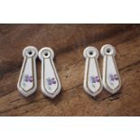 Two pairs of ceramic keyhole covers { 7cm H X 2cm W }.