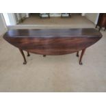 Irish mahogany wakes table raised on cabriole legs and pad feet in the Georgian manner {76 cm H x