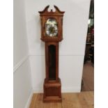 Walnut grandmother clock with brass arched dial and glazed long door { 185cm H X 40cm W X 25cm D }.