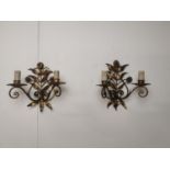 Pair of gilded metal two branch wall sconces { 25cm H X 25cm W X 13cm D }.