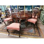 Set of eight + two Ewdardian mahognay dining room chairs with upholstered seats raised on Queen