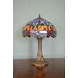 Decorative table lamp on bronzed column with Tiffany style shade . { 50cm H X 30cm Dia }.