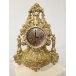 19th C. decorative cast iron mantle clock in the Rococo style. {43 cm H x 34 cm W x 15 cm D}.
