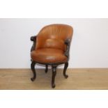 Leather upholstered mahogany swivel tub chair raised on cabriole legs { 86cm H X 56cm W X 77cm D }