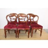 Set of fourteen mahogany balloon backed dining chairs raised on turned legs { 90cm H X 50cm