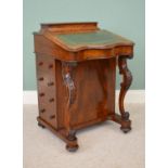 19th. C. walnut davenport with tooled leather inset top side drawers and raised on cabriole legs {