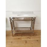Marble top and basin mounted on chrome radiator stand { 96cm H X 91cm W X 51cm D }.